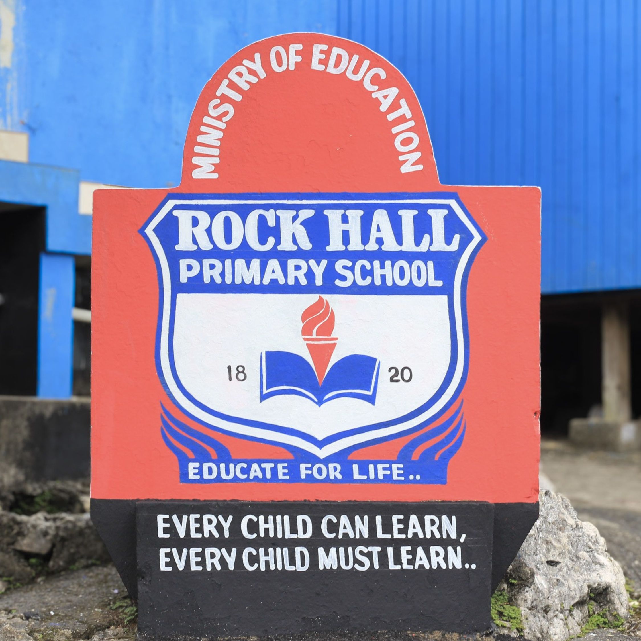 School sign after restoration